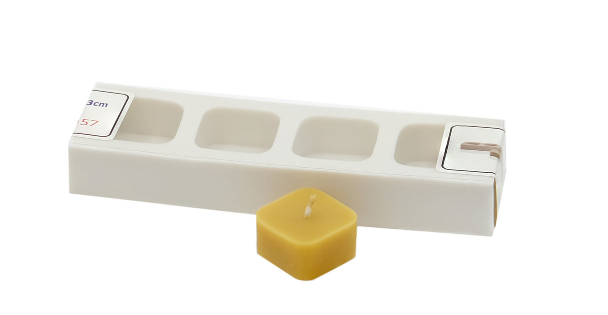Stable, durable silicone candle mold for 4 tea lights in a cuboid shape. Food-grade silicone.