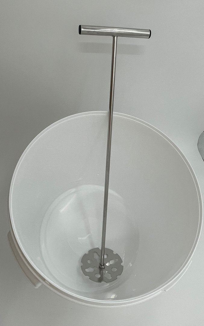 Op en neer honingroerder grote handmatige honing romig roeren met handvat