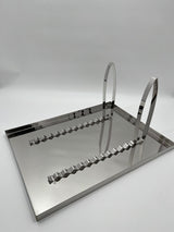 Roestvrijstalen deksel voor het ontsluiten van serviesgoed met honingraatframestandaard